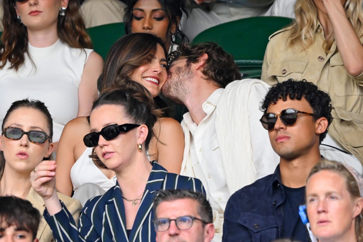 Garfield kissed Barbaro's cheek while watching the game