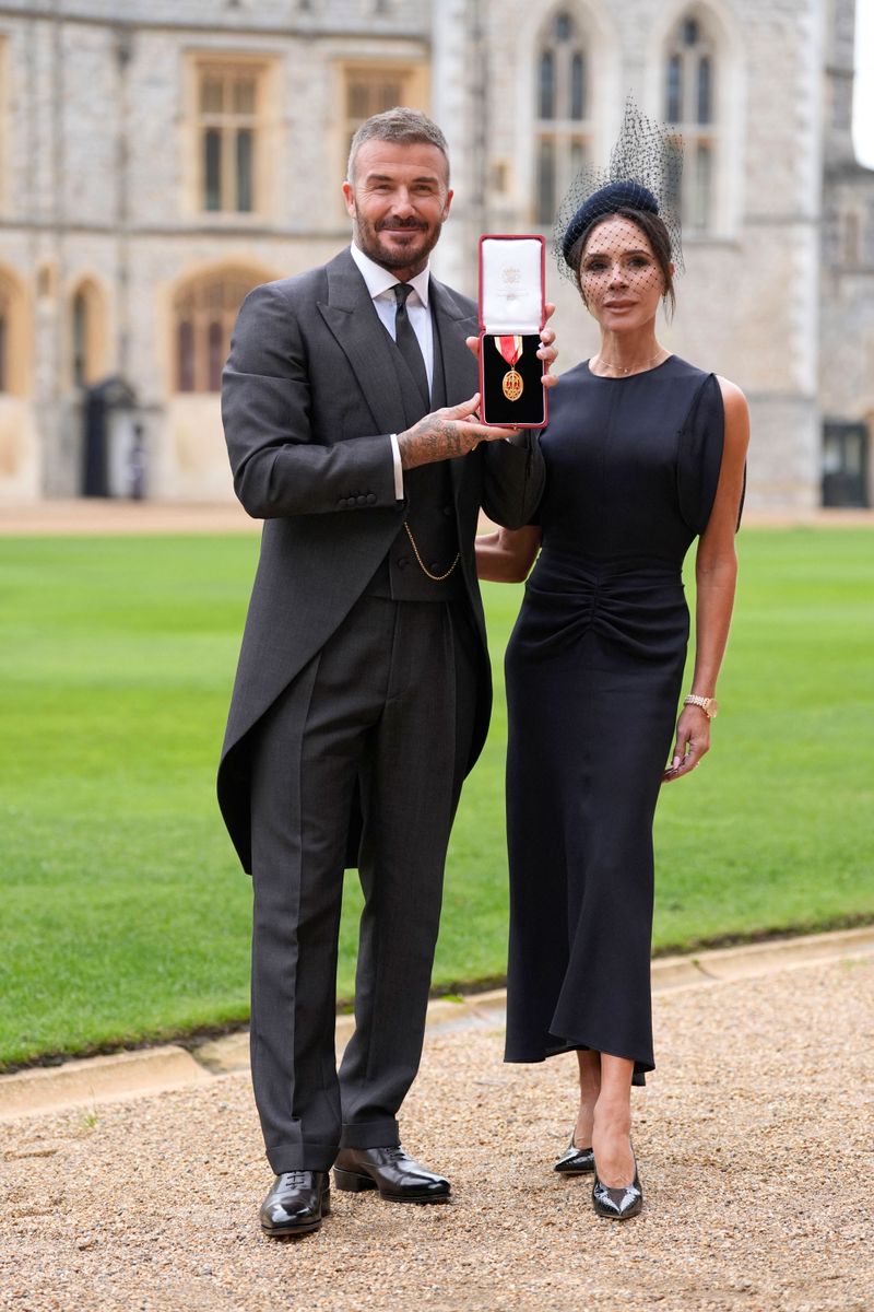 Victoria Beckham becomes Lady Beckham in royal-favorite dress: Designs David Beckham’s Windsor suit       