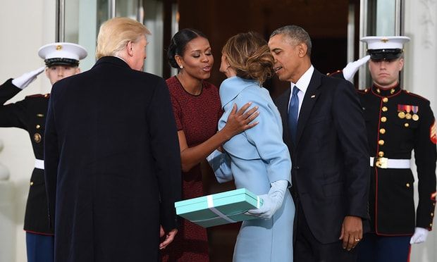 Melania Trump, who wore custom Ralph Lauren, presented Michelle with a box from Tiffany &. Co.
Photo: Getty Images