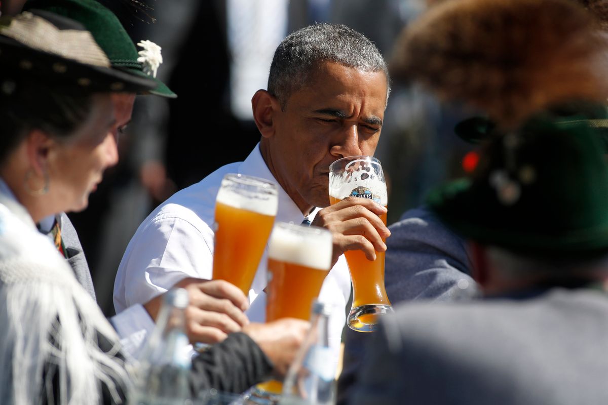 KRUEN, GERMANY - JUNE 07:  U.S. President Barack Obama enjoys a beer in the morning of the summit of G7 nations on June 7, 2015 in Kruen, Germany. In the course of the two-day summit G7 leaders are scheduled to discuss global economic and security issues, as well as pressing global health-related issues, including antibiotics-resistant bacteria and Ebola. Several thousand  protesters have announced they will seek to march towards Schloss Elmau and at least 17,000 police are on hand to provide security.  (Photo by Goran Gajanin - Pool/Getty Images)