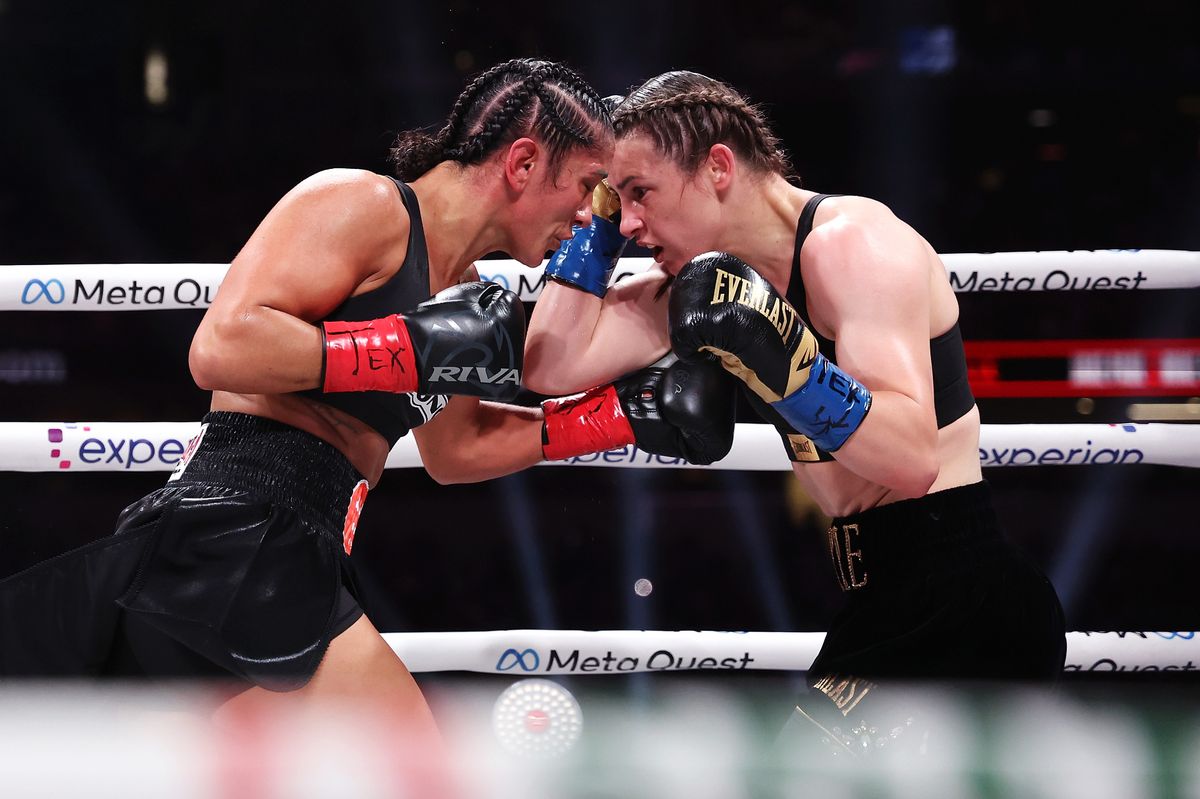 (L-R) Katie Taylor and Amanda Serrano fight during LIVE On Netflix: Jake Paul vs. Mike Tyson at AT&T Stadium on November 15, 2024 in Arlington, Texas. (Photo by Sarah Stier/Getty Images for Netflix Â© 2024)
