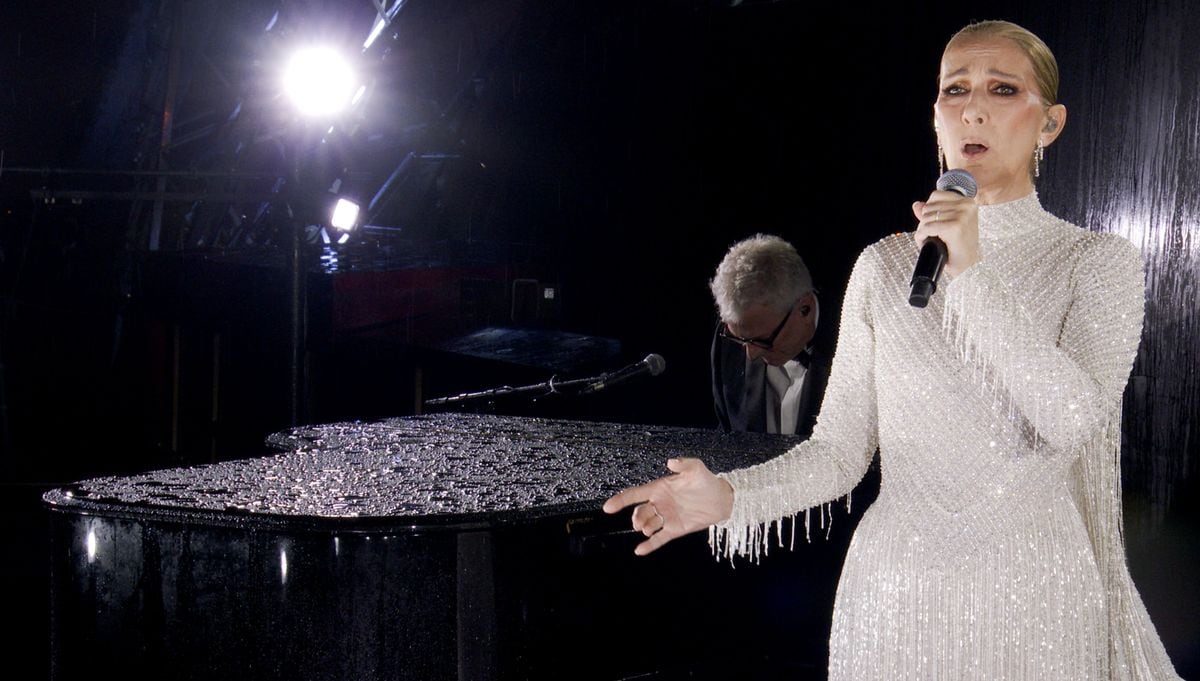 This handout, released by the Olympic Broadcasting Services, shows a view of singer Celine Dion performing on the Eiffel Tower during the opening ceremony of the Paris 2024 Olympic Games Paris 2024 on July 26, 2024, in Paris, France. 