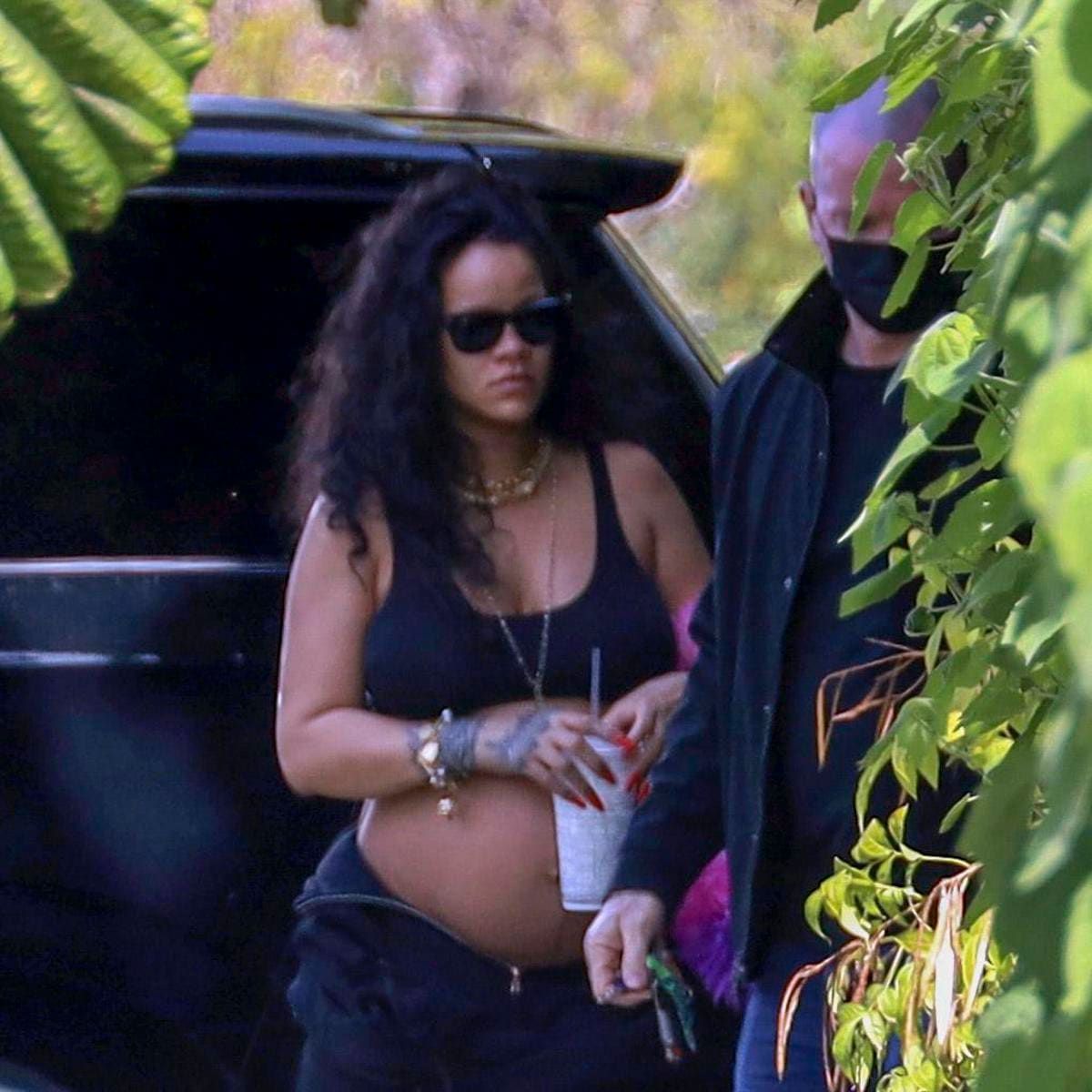 Rihanna Shows Off her Growing Baby Bump