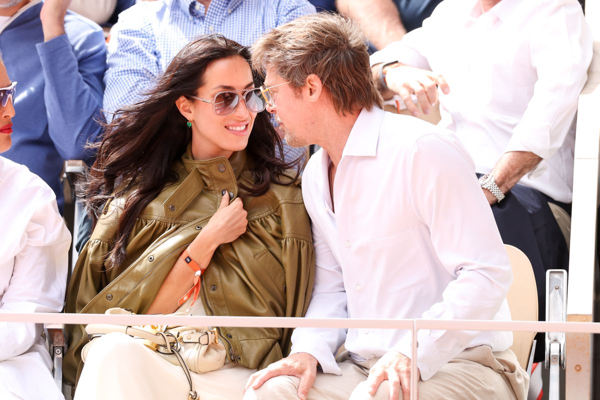 Brad Pitt's girlfriend Inés de Ramón turns heads in plunging halter top and white lace-up jeans