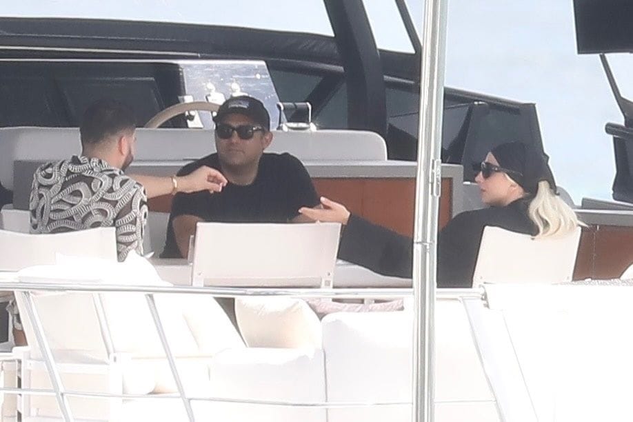 

Lady Gaga and her fiancé Michael Polansky were spotted enjoying a sunny yacht day in Miami Bay with friends. Taking a break from her tour, the singer looked relaxed in a chic black one-piece swimsuit as she soaked up the sun, cruised along the water, and shared laughs with her loved ones.