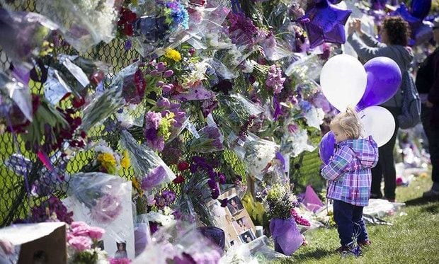 Fans have lined up outside of Paisley Park since it was announced that the <i>Purple Rain</i> singer died.
<br>
Photo: Getty Images