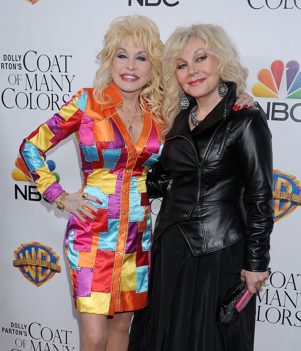 HOLLYWOOD, CA - DECEMBER 02: Singer Dolly Parton and sister Stella Parton arrive at the premiere of Warner Bros. Television's "Dolly Parton's Coat Of Many Colors" at the Egyptian Theatre on December 2, 2015 in Hollywood, California. (Photo by Gregg DeGuire/WireImage)