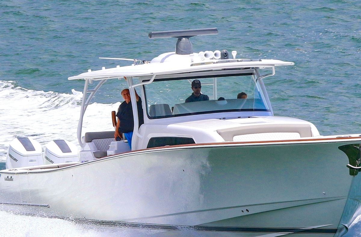 Enrique Iglesias spends quality time with daughter Mary and father-in-law Sergei Kournikova on a sunny Miami day.