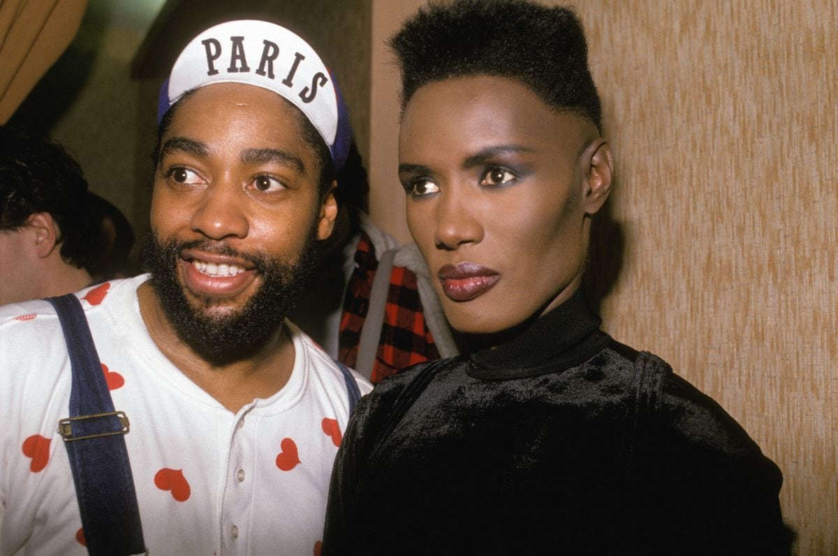 Grace Jones in her dressing room with fashion designer Patrick Kelly