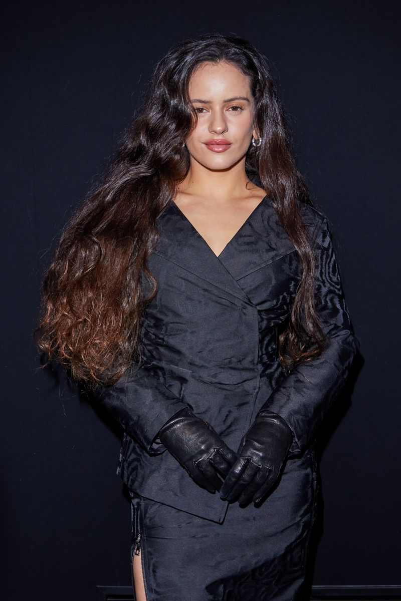 Rosalia's new uniform includes long skirts, soft knits, polished blazers, and delicate shoes. 