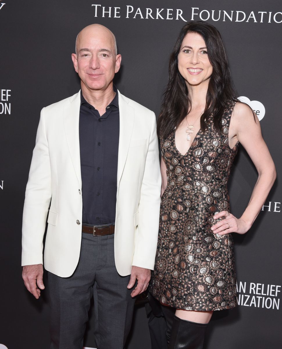 Chief Executive Officer of Amazon Jeff Bezos (L) and MacKenzie Bezos attend the 7th Annual Sean Penn & Friends HAITI RISING Gala