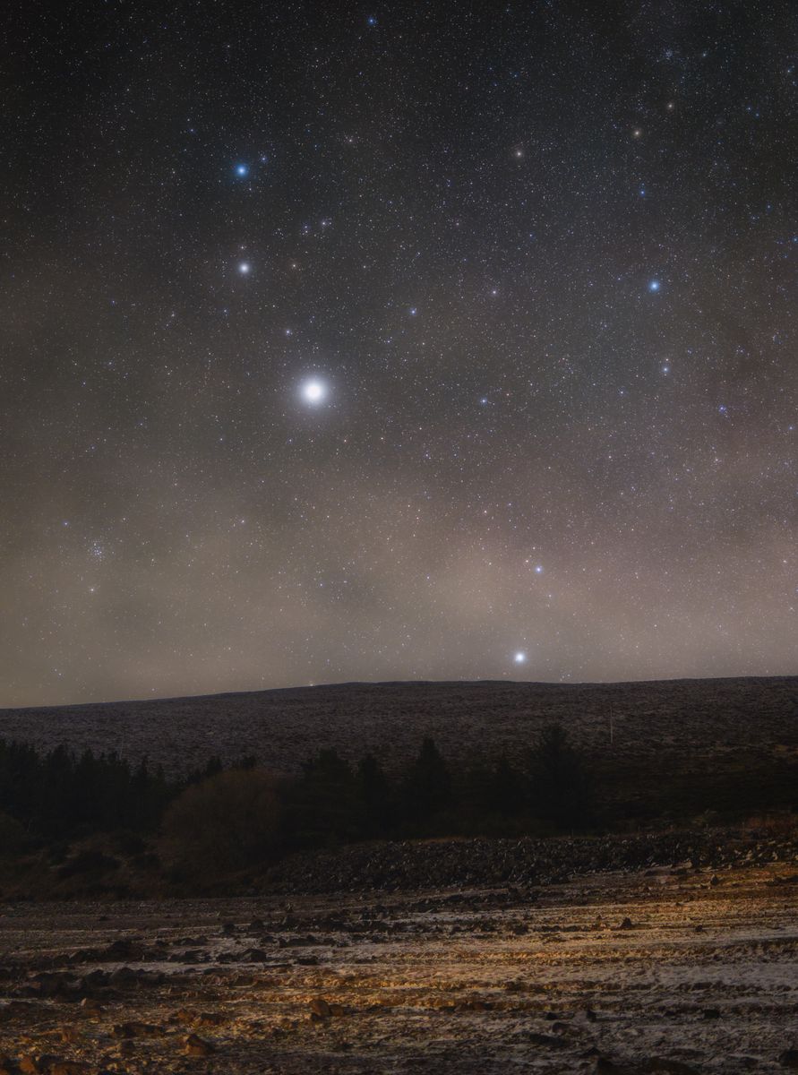 Jupiter, the largest of our solar system, aligns with stars Castor and Pollux from the constellation Gemini.