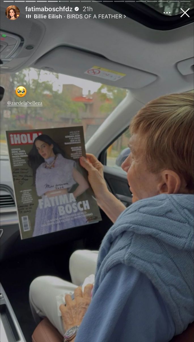 Sousa staring at Fatima's ¡HOLA! magazine cover.