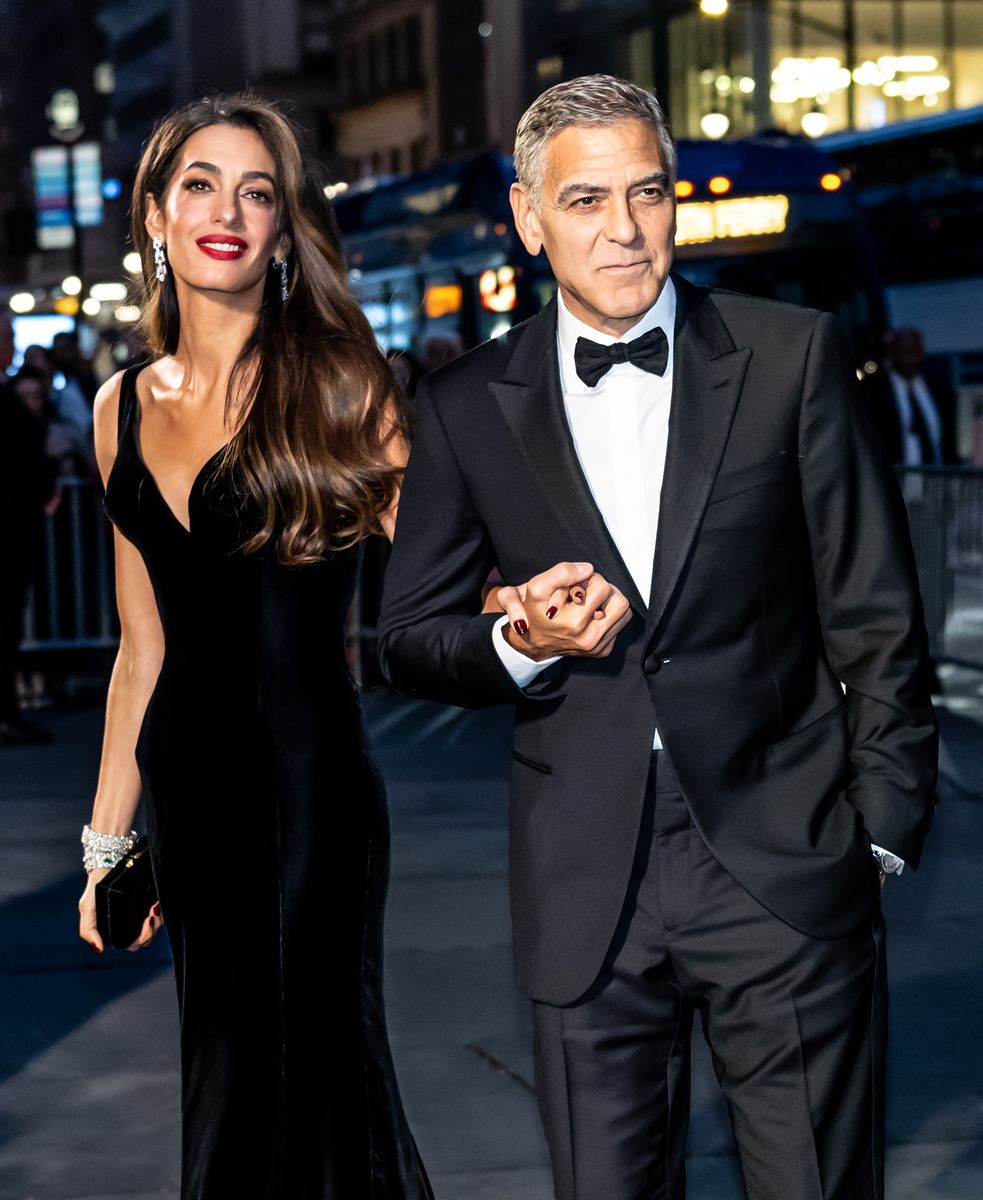 NEW YORK, NEW YORK - SEPTEMBER 26: Amal Clooney and George Clooney are seen arriving to the Clooney Foundation for Justice's The Albies at New York Public Library on September 26, 2024 in New York City. (Photo by Gilbert Carrasquillo/GC Images) 