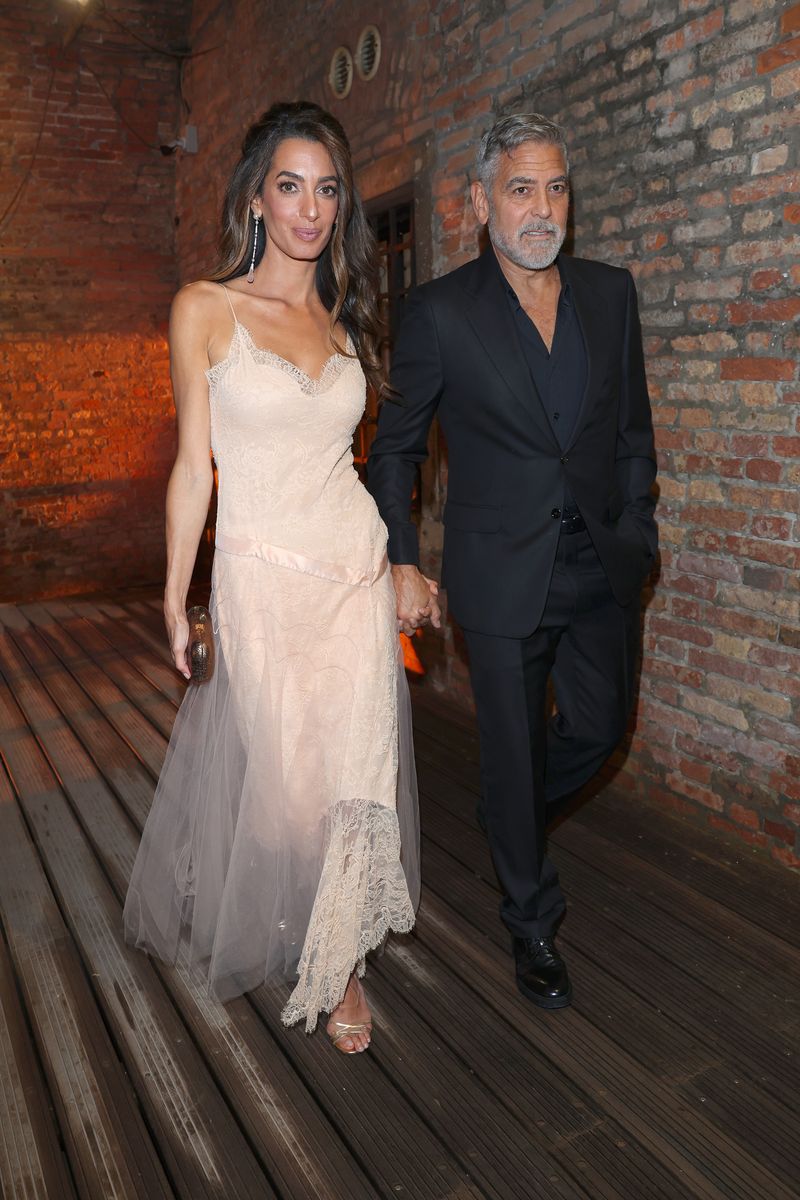 Amal Clooney and George Clooney attend the DVF Awards 2023