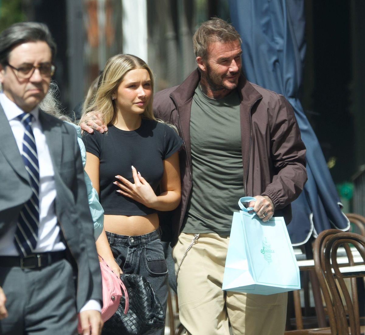 David Beckham was seen walking through the streets of New York City with his daughter Harper Beckham.