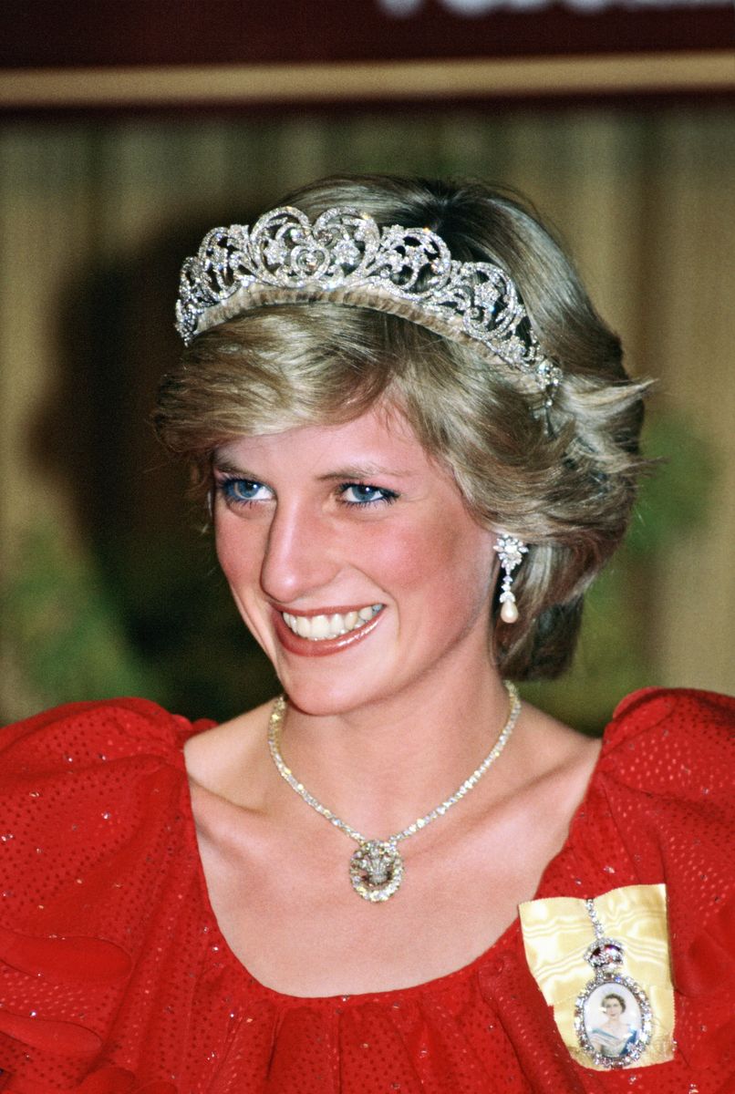 Princess Diana wore the Prince of Wales feathers brooch as a diamond necklace pendant during an official visit to Hobart, Australia. Kate has since worn the historic jewel as a brooch.