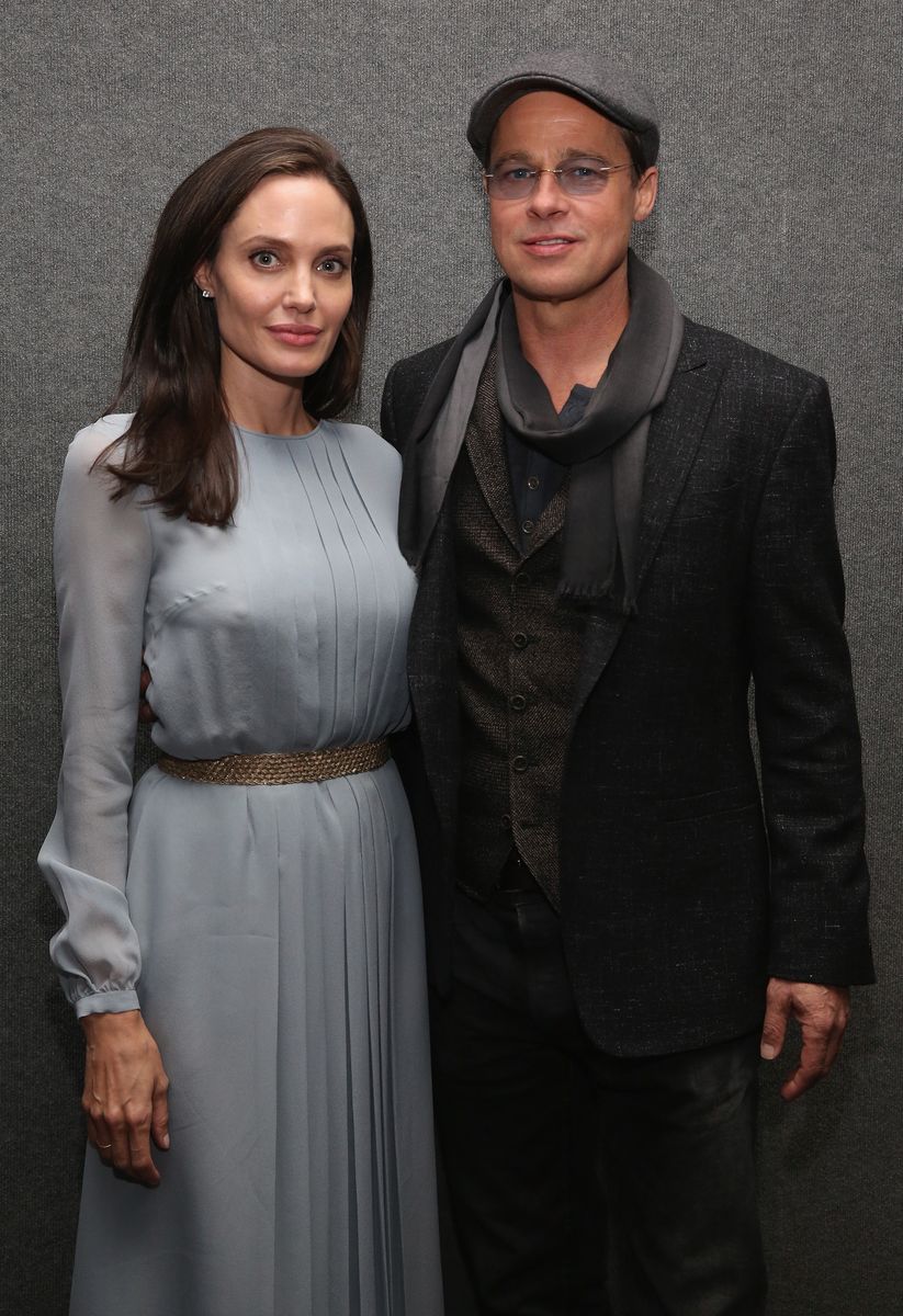 Angelina Jolie (L) and Brad Pitt attend an official Academy Screening of BY THE SEA hosted by The Academy Of Motion Picture Arts And Sciences on November 3, 2015 in New York City.  (Photo by Robin Marchant/Getty Images for Academy of Motion Picture Arts and Sciences)