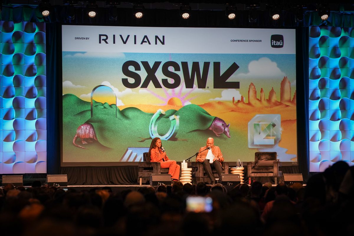 AUSTIN, TEXAS - MARCH 13: Michelle Obama and Craig Robinson speak onstage during a recording of the "IMO with Michelle Obama & Craig Robinson" podcast during the 2025 SXSW Conference And Festival at Austin Convention Center on March 13, 2025 in Austin, Texas. (Photo by Julia Beverly/WireImage)Michelle Obama, Craig Robinson & Dr. Laurie Santos" during SXSW Conference & Festivals at Austin Convention Center