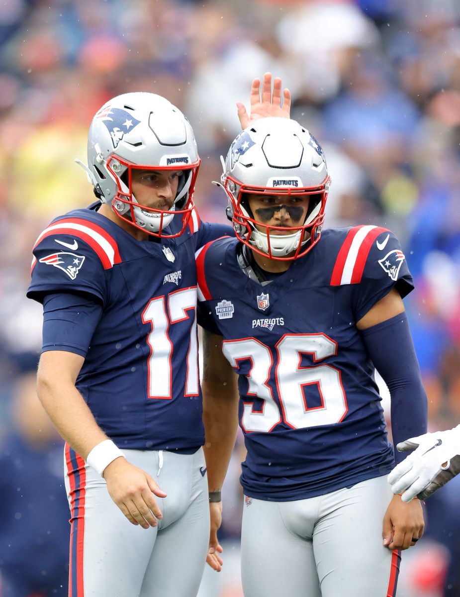 Bryce Baringer #17 and Andy Borregales #36 of the New England Patriots react after making a field goal during the game against the Las Vegas Raiders.