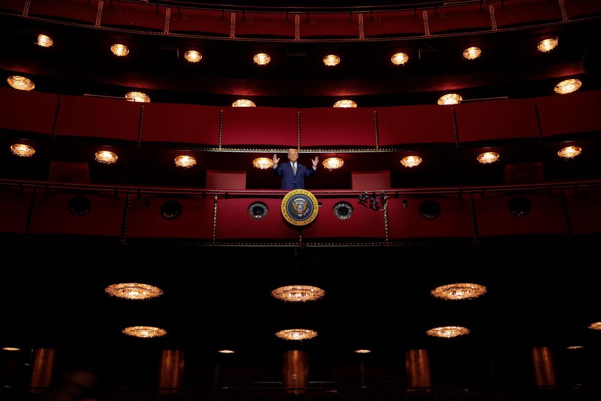 President Donald Trump looks down from the Presidential Box in the Opera House at the John F. Kennedy Center for the Performing Arts as he leads a board meeting 