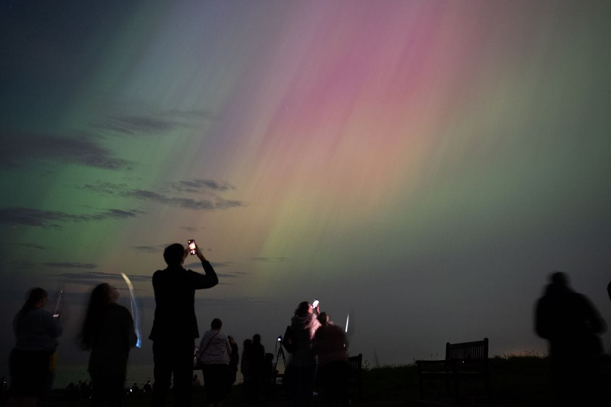People visit St Mary's lighthouse in Whitley Bay to see the aurora borealis, commonly known as the northern lights.
