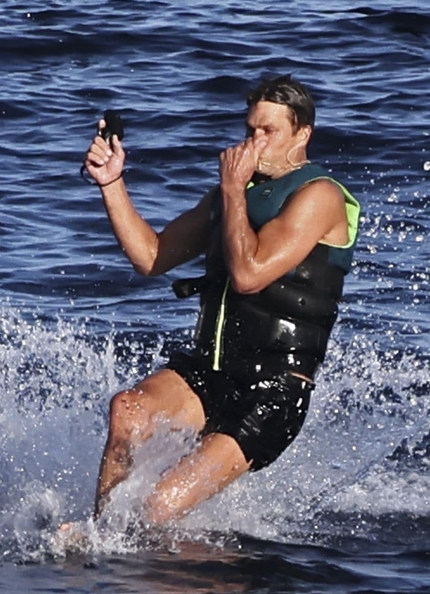 The NFL star took to the water after a relaxed lunch with loved ones.