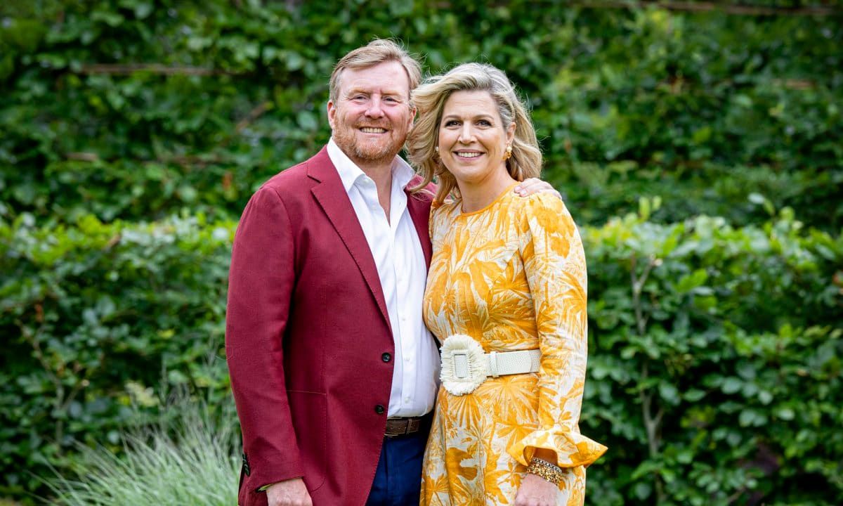 The royal mom of three wore a vibrant palm print dress from Zimmermann. The King opted for a burgundy blazer and navy trousers.