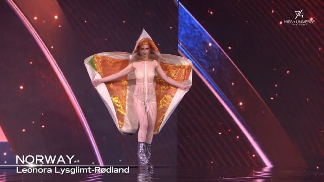 Miss Norway slipped out of the salmon exterior to unveil a semi-sheer bodysuit designed to mimic the inside of the fish