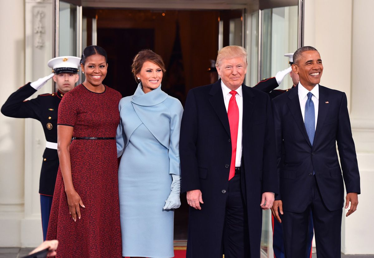 President Barack Obama and Michelle Obama pose with President-elect Donald Trump and wife Melania at the White House before the inauguration on January 20, 2017 