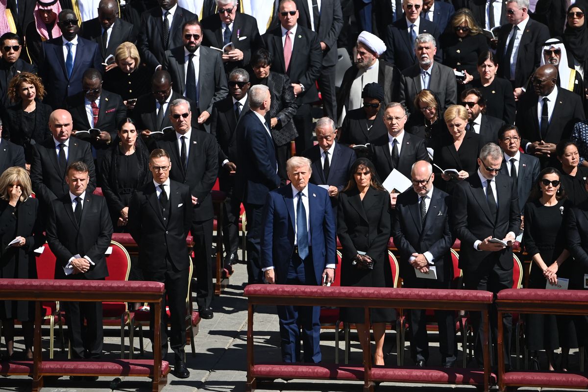 US President Donald Trump and First Lady Melania Trump stand alongside leaders including France's President Emmanuel Macron and Finland's President Alexander Stubb as they attend the late Pope Francis' funeral ceremony at St Peter's Square at the Vatican on April 26, 2025