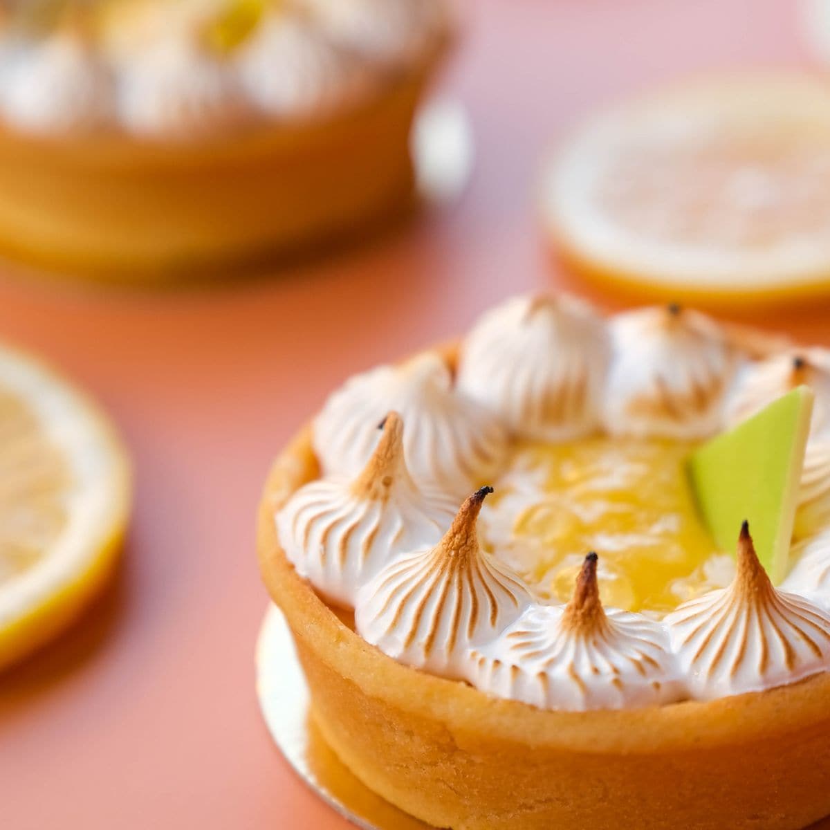 A sweet custard base with a fluffy meringue topping flavored with port wine.