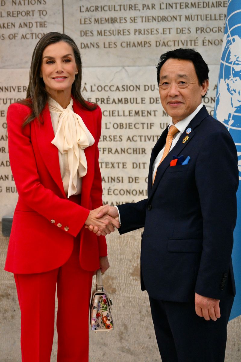 Spain's Queen Letizia has made the tailored suit her uniform for official appearances, whether morning or evening events. 