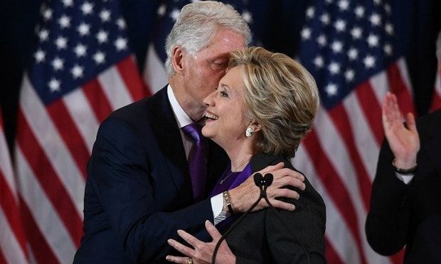 Hillary's husband Bill matched his purple tie to his wife's blouse.
Photo: JEWEL SAMAD/AFP/Getty Images