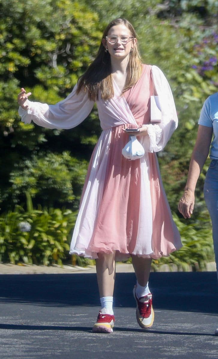 
Violet Affleck was spotted in Brentwood wearing the same two-toned Dolce & Gabbana wrap dress that her stepmom Jennifer Lopez wore in 2023. 