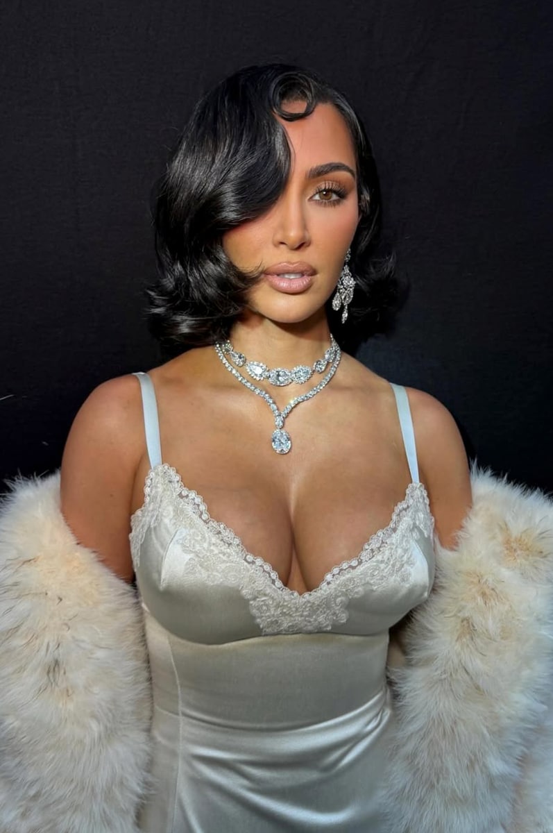 Kim Kardashian poses in Elizabeth Taylor's personal earrings