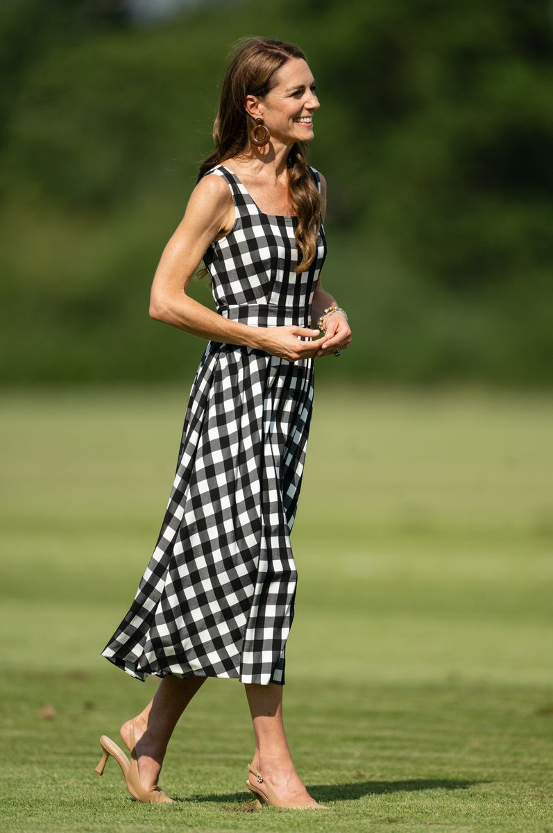 Kate Middleton returned to the Royal Charity Polo Cup in Windsor for the first time in years wearing a breezy gingham dress by Temperley London.