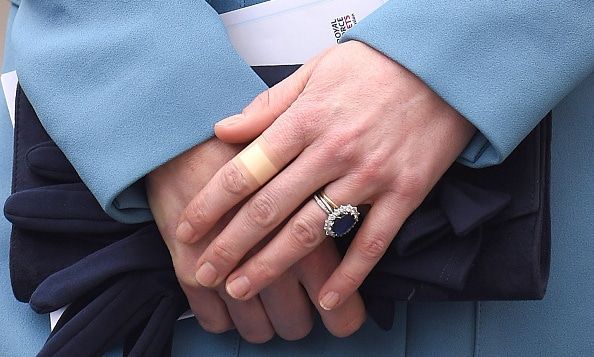 Along with her sapphire engagement ring, and her navy clutch and gloves, there was an unexpected accessory a Band-Aid.
<br>
Photo: Getty ImagesPhoto: Getty Images