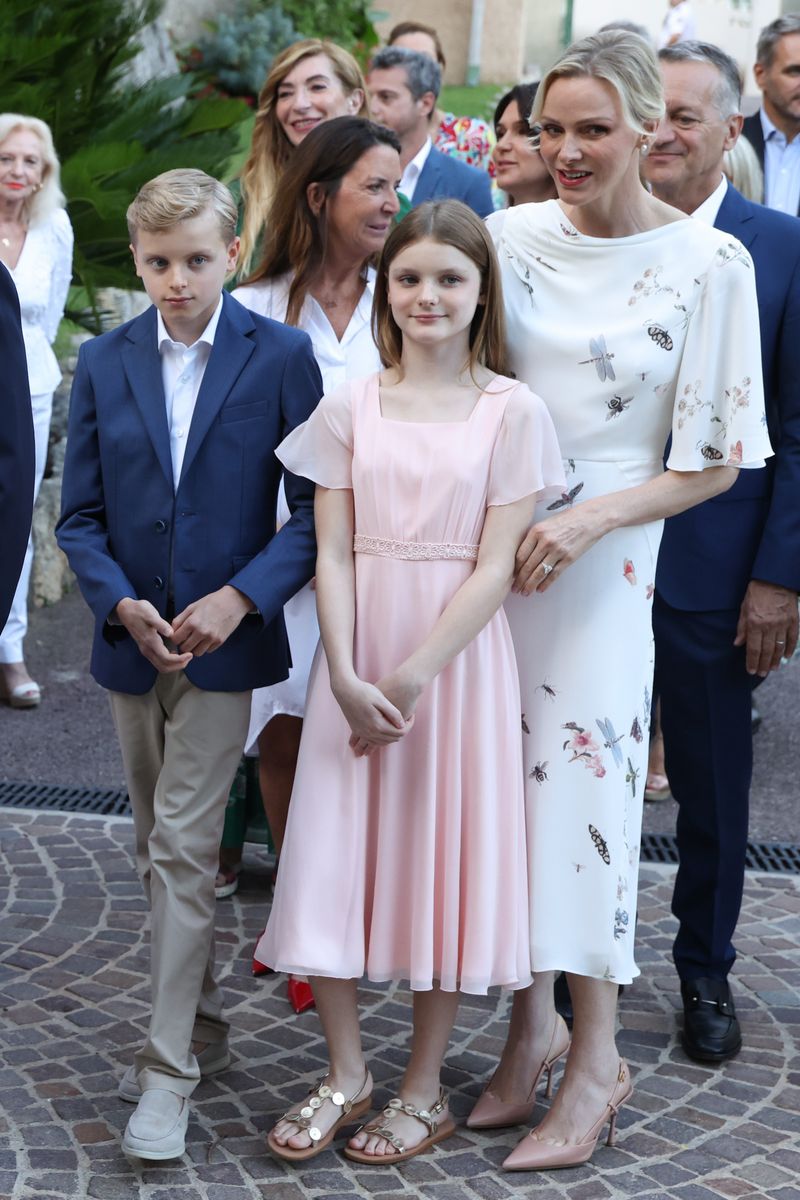 Princess Gabriella wore her long hair down and paired her flowing pink dress with simple sandals for the traditional Monaco celebration.