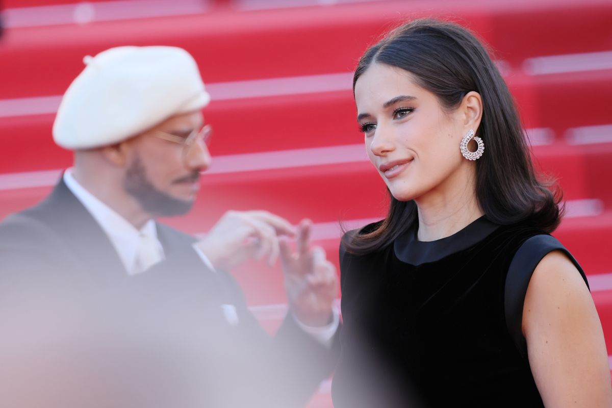 John Travolta and Ella Bleu Travolta attend the "Karma" screening during the 79th annual Cannes Film Festival
