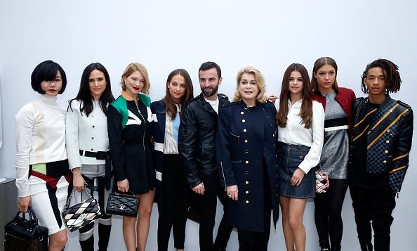 Nicolas and his stars! (From left: Bae Doona, Jennifer Connelly, Lea Seydoux, Alicia Vikander, stylist Nicolas Ghesquiere, Catherine Deneuve, Selena Gomez, Adele Exarchopoulos and Jaden Smith pose backstage after the Louis Vuitton show.
<br>
Photo: Getty Images