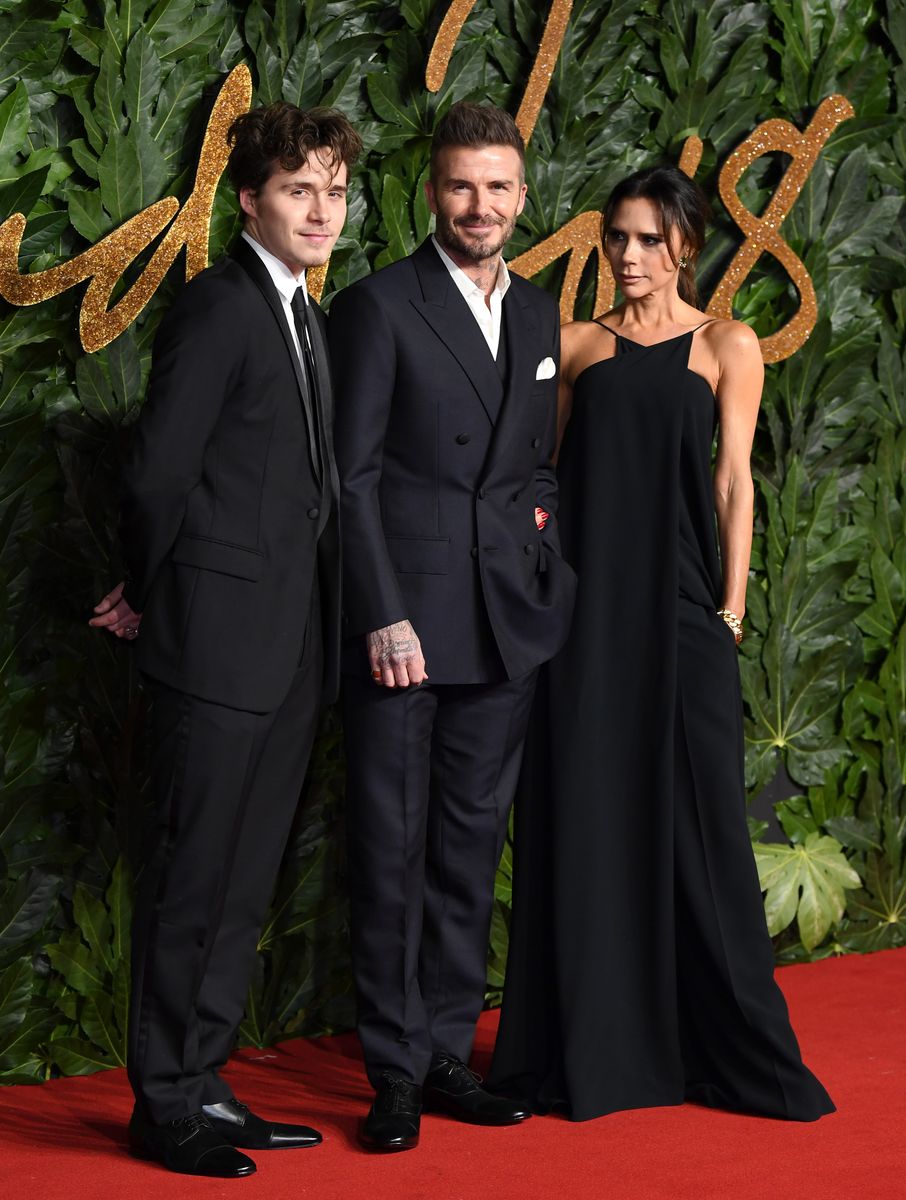 Brooklyn Beckham, David Beckham and Victoria Beckham arrive at The Fashion Awards 2018 In Partnership With Swarovski at Royal Albert Hall on December 10, 2018 in London, England. (Photo by Karwai Tang/WireImage)