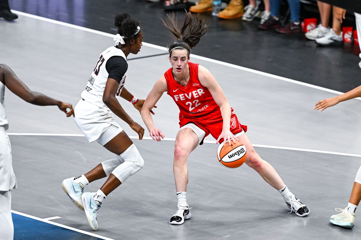 Indiana guard Caitlin Clark (22) looks to pass during the WNBA game between the Indiana Fever and the Atlanta Dream