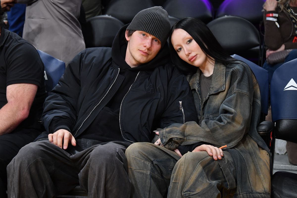 Noah Cyrus and Pinkus attend a basketball game between the Los Angeles Lakers and the Minnesota Timberwolves 