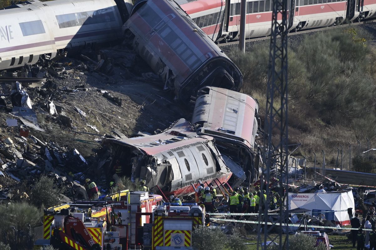 Preliminary information suggests that a Renfe AVE train struck the rear of a stationary Iryo train, causing two carriages to derail and fall down an embankment. 