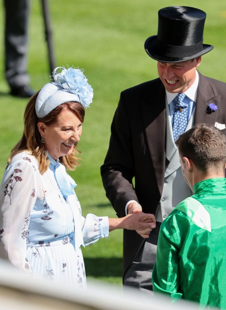 Carole Middleton holds hands with Prince William