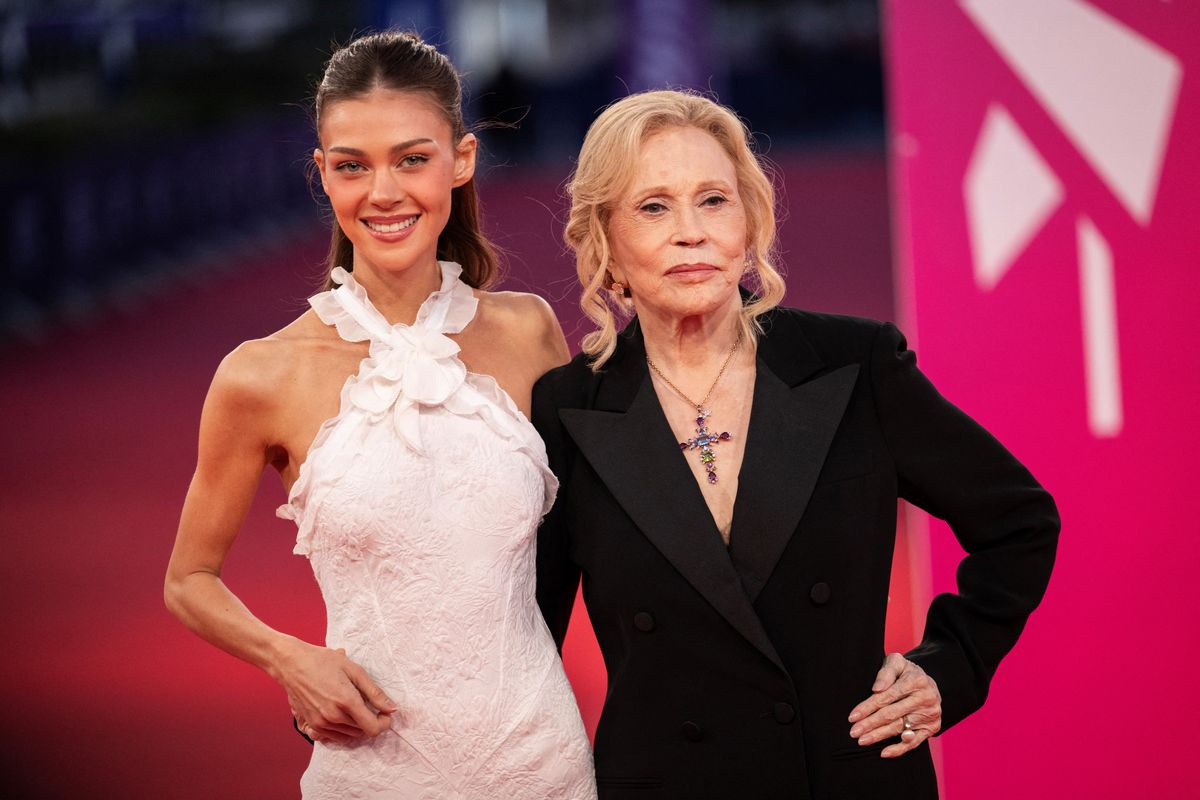 Nicola Peltz Beckham and Faye Dunaway pose on the red carpet during the 52nd edition of the Deauville American film festival