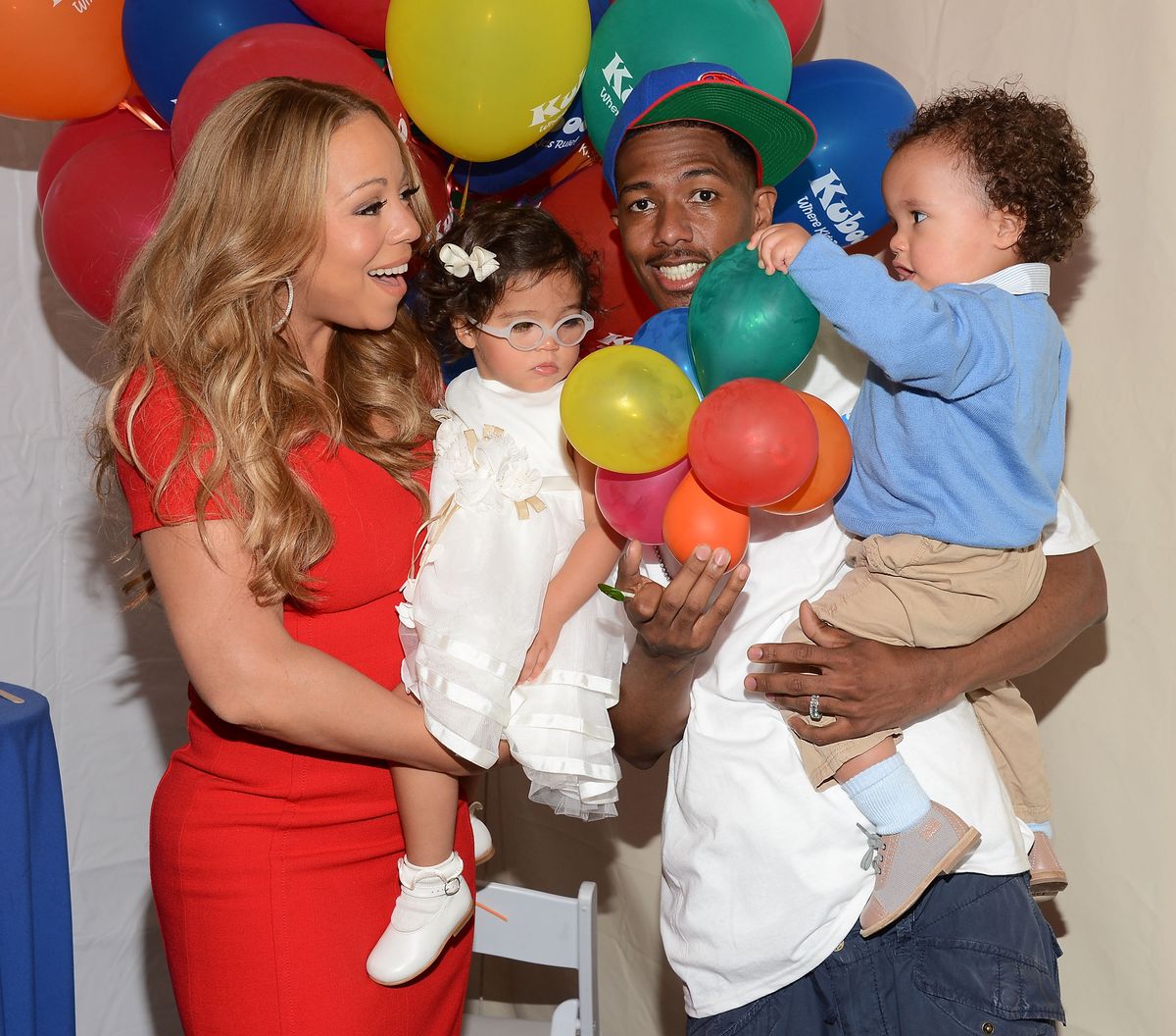   Recording artist Mariah Carey, her husband Nick Cannon and their children Monroe Cannon (L) and Moroccan Cannon attend "Family Day" hosted by Nick Cannon at Santa Monica Pier on October 6, 2012 in Santa Monica, California.  (Photo by Amanda Edwards/Getty Images)