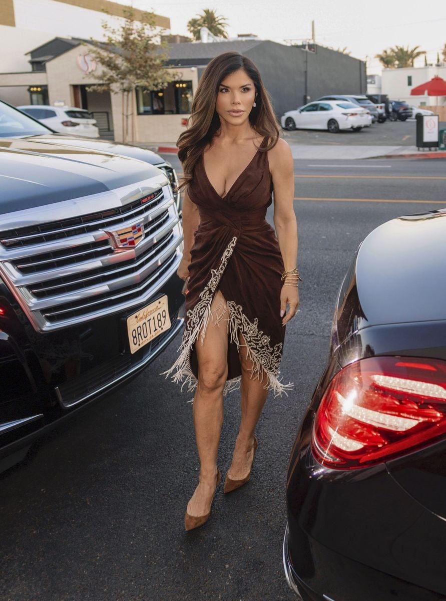 Lauren dazzled in a vintage 2008 Christian Dior gown by John Galliano, paired effortlessly with brown heels