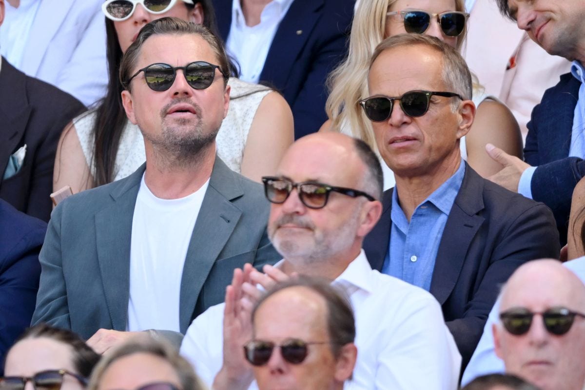 DiCaprio opted for a white t-shirt and a grey jacket
